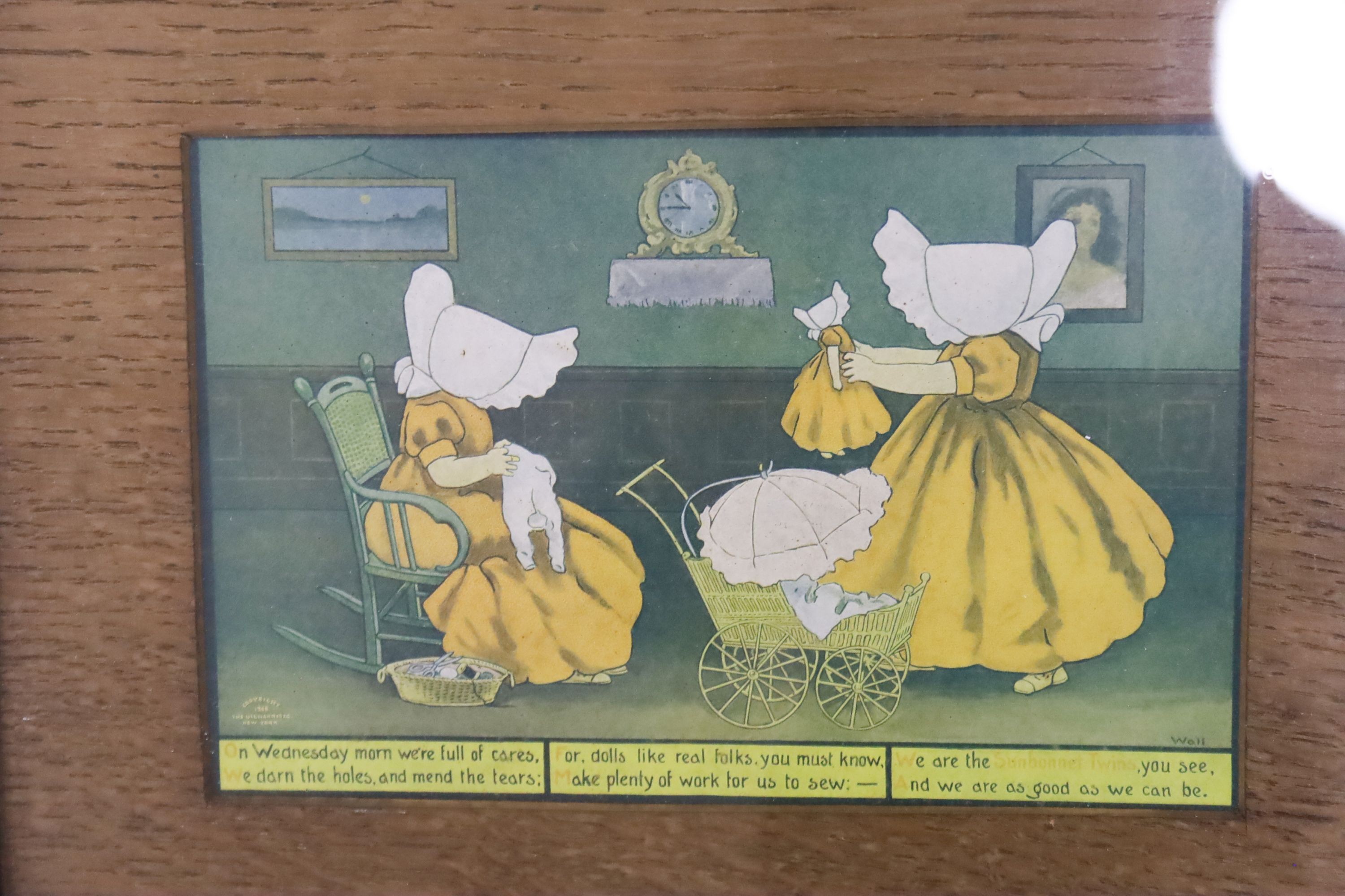A set of seven sunbonnet twins oak framed 'days of the week' litho prints copyright 1905 by the Ullman mfg Co. New York